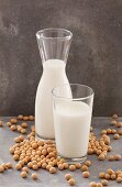 Soya milk in a carafe and in a glass