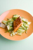 Salmon with a mustard and ginger glaze and a spicy cucumber salad