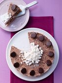 Iced chocolate cake with meringue and cream