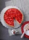 Strawberry tart with white chocolate, sliced