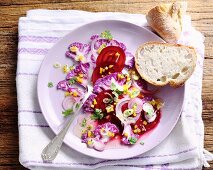 Raw purple salad with cauliflower and beetroot