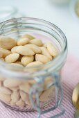 A jar of shelled almonds
