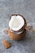 A fresh coconut, cracked open