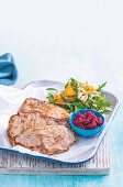 Pork steaks with beetroot pesto