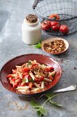 Vegetarian penne pasta with goji berries, tomatoes and mince