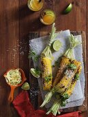 Grilled corn cobs with coriander, Parmesan, chilli and garlic butter