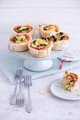 Filo tartlets with salmon, broccoli and apples