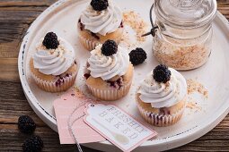 Blackberry and coconut cupcakes with soya cream frosting
