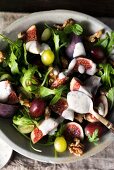 Rocket salad with figs, grapes, walnuts and a yoghurt dressing