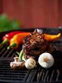 Steak and vegetables on a barbecue