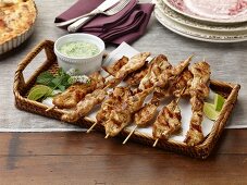 Spicy cajun chicken skewers with a herb dip