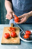 Tomatoes being peeled