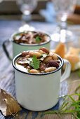 Clear oxtail soup with beans for a winter picnic (South Africa)