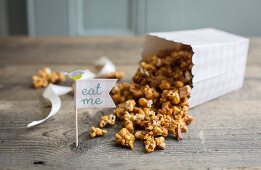 Homemade caramel popcorn with dried apple pieces