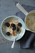 Millet porridge with blackberries and hazelnuts