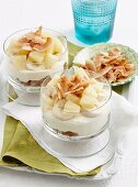 Banana trifle with coconut flakes