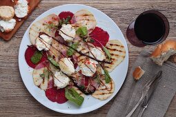 Beetroot carpaccio with grilled fruit, goat's cheese and maple syrup