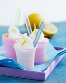 Lemon sorbet in pink plastic cups