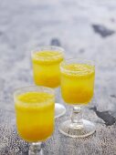 Fizzy cocktails with orange juice, rum and mineral water