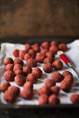 Beetroot falafel on a baking tray