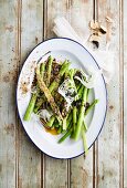 Asparagus salad with biltong, black garlic, fennel and olive butter (South Africa)