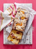 Peach melba crumble cake