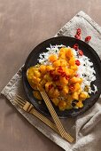 Pumpkin curry with chilli peppers and rice