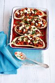 Aubergines stuffed with kidney bean, tomatoes and feta cheese