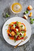 Scallops with a clementine glaze on a fennel and grapefruit salad