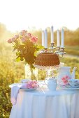 A table laid in the countryside for a romantic breakfast for two