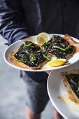 Flounder in sour cream butter with lemon leaves