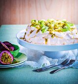 Pavlova with cream, kiwi & passion fruit