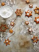 Star shaped pernik (Czech gingerbread biscuits) decorated with sugar stars