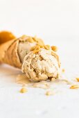 Peanut butter and banana frozen yoghurt in an ice cream cone