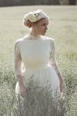 A young bride in an oat field