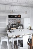 Vintage kitchen with dining area in Scandinavian log cabin