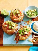 Cheesy ham and avocado baked potato