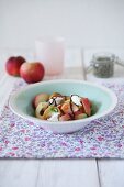 Summer salad with tomatoes, white peaches, mozzarella and balsamic cream