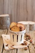 Sables with hazelnuts in a wooden basket