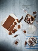 Caramel bonbons being cut and packaged