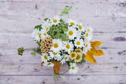 Bouquet with ox-eye daisies and yarrow