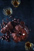 Whiskey and chocolate pudding with cherries