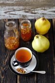 A cup of tea with quince syrup