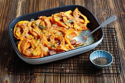 Pumpkin and sweet potato bake with sausages