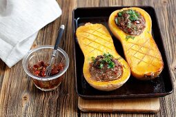 Stuffed butternut squash with minced turkey and dried tomatoes