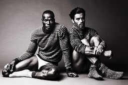 Two men wearing jumpers and underpants (black-and-white shot)