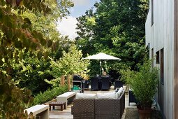 Modern outdoor furniture on terrace in garden