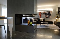 Dark grey modern gas fireplace in elegant interior