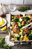 A Greek rice dish with chicken and broccoli
