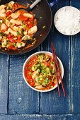 Sweet and sour chicken with broccoli and pepper (Asia)